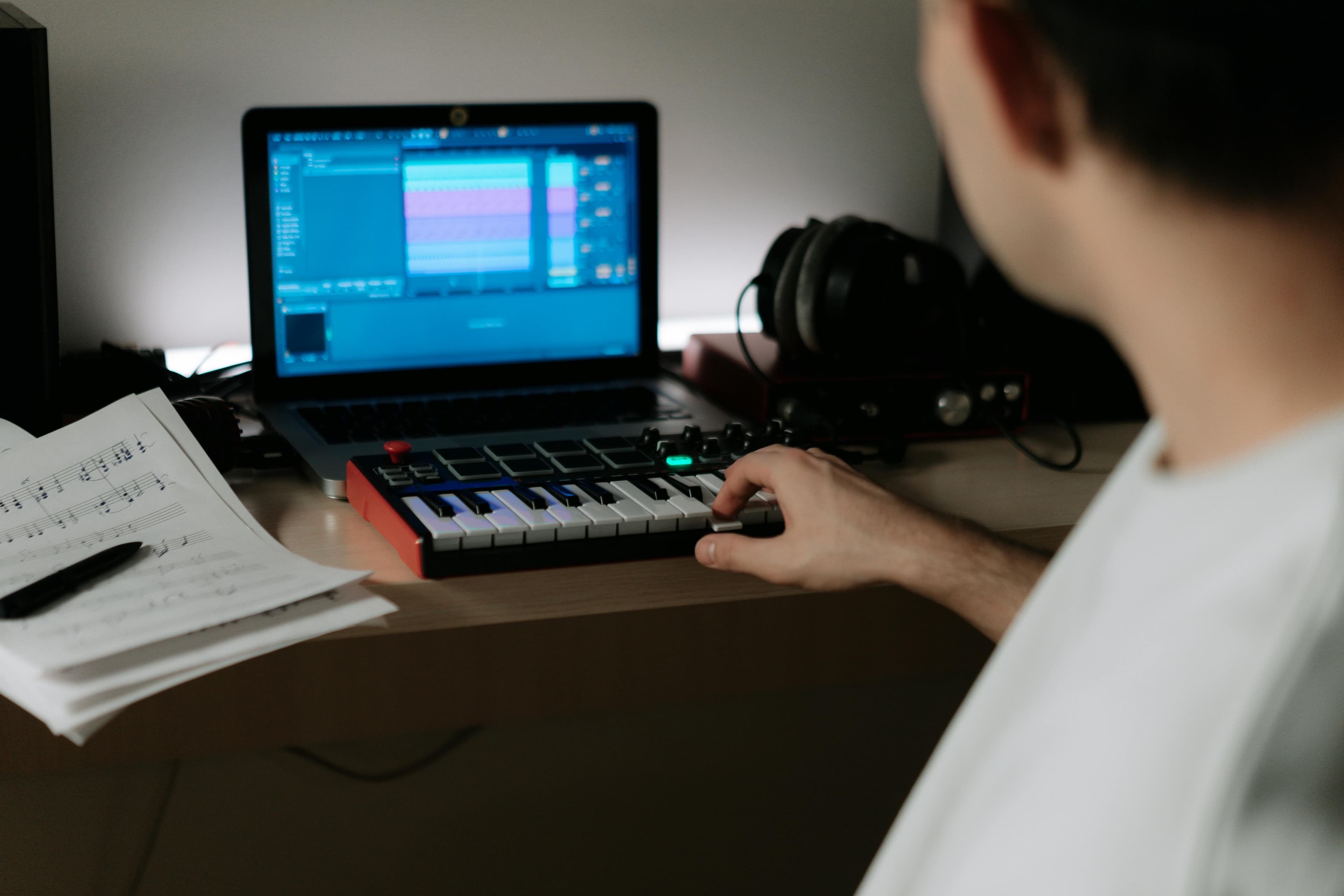 A man playing a synthesizer